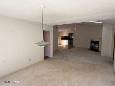 Two bedrooms, two and one half bath home nestled in the heart of on Inland Greens Golf Course in North Carolina - for sale on GolfHomes.com, golf home, golf lot