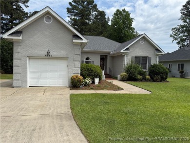 Check out this stunning home in the sought-after Kings Grant on Kings Grant Golf and Country Club in North Carolina - for sale on GolfHomes.com, golf home, golf lot