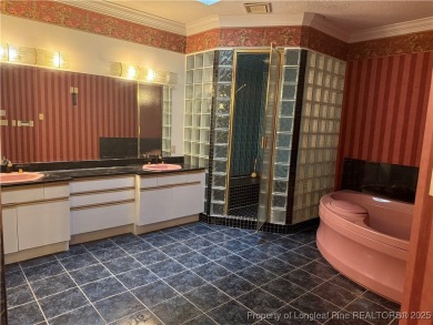 Check out this stunning home in the sought-after Kings Grant on Kings Grant Golf and Country Club in North Carolina - for sale on GolfHomes.com, golf home, golf lot