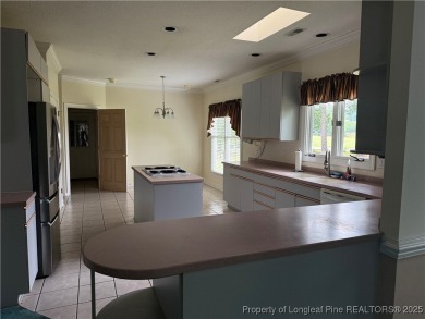 Check out this stunning home in the sought-after Kings Grant on Kings Grant Golf and Country Club in North Carolina - for sale on GolfHomes.com, golf home, golf lot