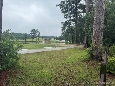 Check out this stunning home in the sought-after Kings Grant on Kings Grant Golf and Country Club in North Carolina - for sale on GolfHomes.com, golf home, golf lot