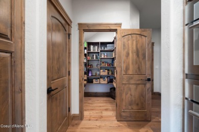 This meticulously maintained custom home in the private, gated on Hayden Lake Country Club in Idaho - for sale on GolfHomes.com, golf home, golf lot