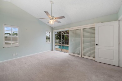 Welcome home to this 3 bedroom, 2 bathroom waterfront home in on Breakers Rees Jones Course in Florida - for sale on GolfHomes.com, golf home, golf lot