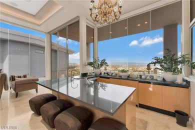 Dazzling unobstructed Strip views overwhelm from this bilevel on Dragon Ridge Country Club in Nevada - for sale on GolfHomes.com, golf home, golf lot