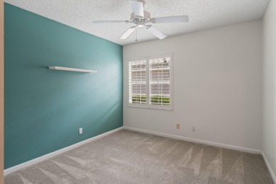 Welcome home to this 3 bedroom, 2 bathroom waterfront home in on Breakers Rees Jones Course in Florida - for sale on GolfHomes.com, golf home, golf lot