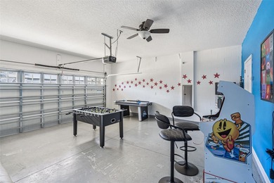 Experience the ultimate Florida lifestyle at 9046 Stinger Dr, a on The Oasis Club at Champions Gate in Florida - for sale on GolfHomes.com, golf home, golf lot