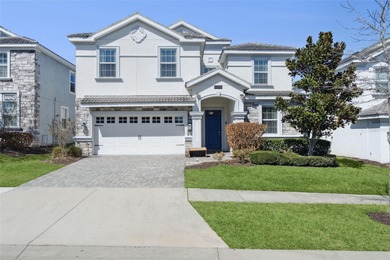 Experience the ultimate Florida lifestyle at 9046 Stinger Dr, a on The Oasis Club at Champions Gate in Florida - for sale on GolfHomes.com, golf home, golf lot