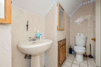 Welcome to this Custom Built, Expanded California Ranch on on Middle Bay Country Club in New York - for sale on GolfHomes.com, golf home, golf lot
