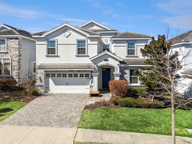 Experience the ultimate Florida lifestyle at 9046 Stinger Dr, a on The Oasis Club at Champions Gate in Florida - for sale on GolfHomes.com, golf home, golf lot