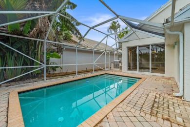 Welcome home to this 3 bedroom, 2 bathroom waterfront home in on Breakers Rees Jones Course in Florida - for sale on GolfHomes.com, golf home, golf lot
