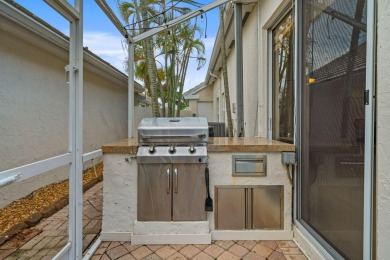 Welcome home to this 3 bedroom, 2 bathroom waterfront home in on Breakers Rees Jones Course in Florida - for sale on GolfHomes.com, golf home, golf lot