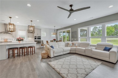Indulge in luxury living w/ this custom-upgraded 2-bed/2-bath + on Argent Lakes Golf Course in South Carolina - for sale on GolfHomes.com, golf home, golf lot