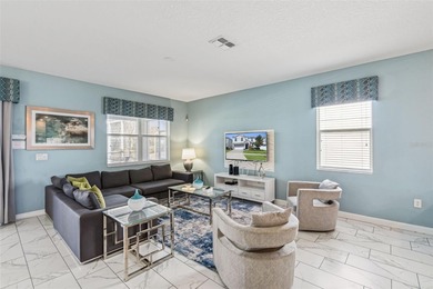 Experience the ultimate Florida lifestyle at 9046 Stinger Dr, a on The Oasis Club at Champions Gate in Florida - for sale on GolfHomes.com, golf home, golf lot