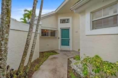 Welcome home to this 3 bedroom, 2 bathroom waterfront home in on Breakers Rees Jones Course in Florida - for sale on GolfHomes.com, golf home, golf lot