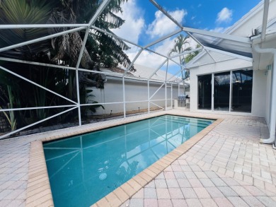 Welcome home to this 3 bedroom, 2 bathroom waterfront home in on Breakers Rees Jones Course in Florida - for sale on GolfHomes.com, golf home, golf lot
