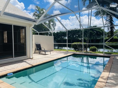 Welcome home to this 3 bedroom, 2 bathroom waterfront home in on Breakers Rees Jones Course in Florida - for sale on GolfHomes.com, golf home, golf lot