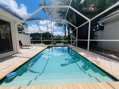 Welcome home to this 3 bedroom, 2 bathroom waterfront home in on Breakers Rees Jones Course in Florida - for sale on GolfHomes.com, golf home, golf lot