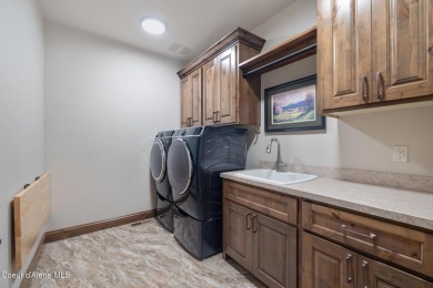 This meticulously maintained custom home in the private, gated on Hayden Lake Country Club in Idaho - for sale on GolfHomes.com, golf home, golf lot