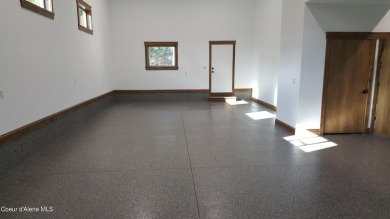 This meticulously maintained custom home in the private, gated on Hayden Lake Country Club in Idaho - for sale on GolfHomes.com, golf home, golf lot
