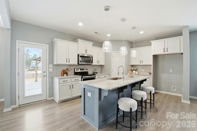 Welcome home to this inviting 3-bedroom, 2.5-bath residence on Stonebridge Golf Club in North Carolina - for sale on GolfHomes.com, golf home, golf lot