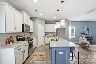 Welcome home to this inviting 3-bedroom, 2.5-bath residence on Stonebridge Golf Club in North Carolina - for sale on GolfHomes.com, golf home, golf lot