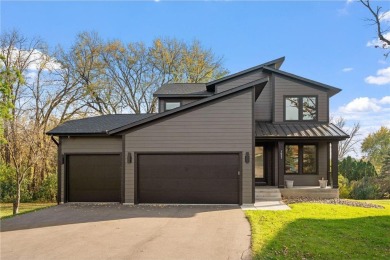 Discover the perfect blend of new construction luxury without on Golden Valley Golf and Country Club in Minnesota - for sale on GolfHomes.com, golf home, golf lot