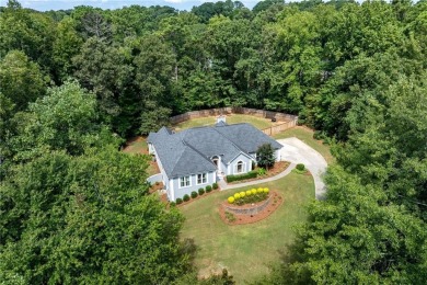 Exceptionally private 1+ acre setting ranch home w/ HUGE on Collins Hill Golf Club in Georgia - for sale on GolfHomes.com, golf home, golf lot