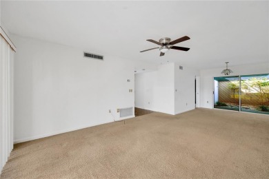 This unique 1-bedroom, 1-bathroom condo sits in the heart of on Carrollwood Country Club in Florida - for sale on GolfHomes.com, golf home, golf lot