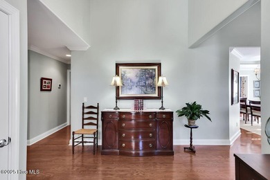 Serene nature views await you in this stunning brick home on Cape Fear National At Brunswick Forest in North Carolina - for sale on GolfHomes.com, golf home, golf lot