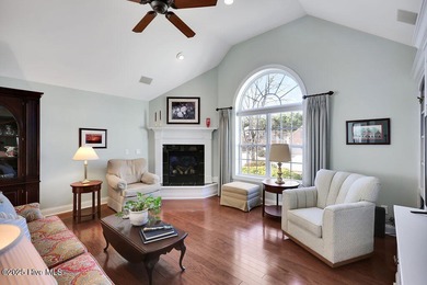 Serene nature views await you in this stunning brick home on Cape Fear National At Brunswick Forest in North Carolina - for sale on GolfHomes.com, golf home, golf lot