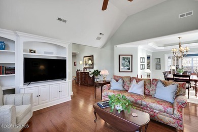 Serene nature views await you in this stunning brick home on Cape Fear National At Brunswick Forest in North Carolina - for sale on GolfHomes.com, golf home, golf lot