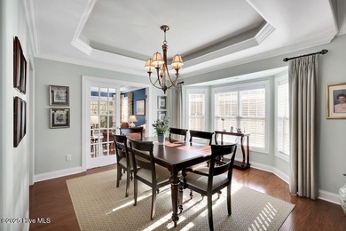 Serene nature views await you in this stunning brick home on Cape Fear National At Brunswick Forest in North Carolina - for sale on GolfHomes.com, golf home, golf lot