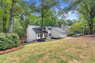 Discover refined living at 3040 Roxburgh Drive in Roswells on Country Club of Roswell in Georgia - for sale on GolfHomes.com, golf home, golf lot