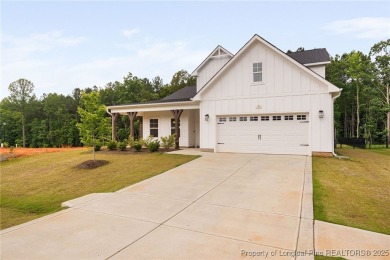 Immaculate, Light-Filled Home with First-Floor Primary & on Olde Liberty Golf and Country Club in North Carolina - for sale on GolfHomes.com, golf home, golf lot