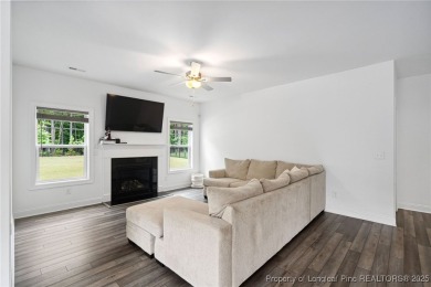 Immaculate, Light-Filled Home with First-Floor Primary & on Olde Liberty Golf and Country Club in North Carolina - for sale on GolfHomes.com, golf home, golf lot