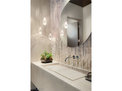 This legacy, desert estate sits perfectly on an elevated lot on on Southern Highlands Golf Club in Nevada - for sale on GolfHomes.com, golf home, golf lot