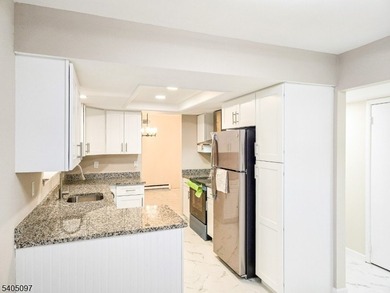 Welcome to this newly renovated 2-bed, 2.5-bath townhouse with on Clearbrook Golf Club in New Jersey - for sale on GolfHomes.com, golf home, golf lot