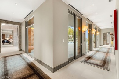 This legacy, desert estate sits perfectly on an elevated lot on on Southern Highlands Golf Club in Nevada - for sale on GolfHomes.com, golf home, golf lot