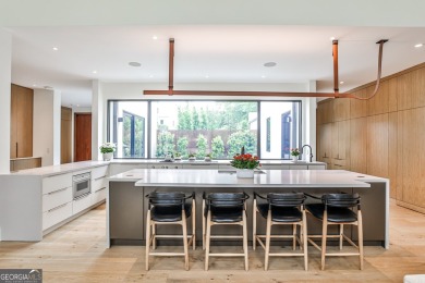 Welcome to this stunning contemporary gem, one of only 5 homes on Druid Hills Golf Club in Georgia - for sale on GolfHomes.com, golf home, golf lot
