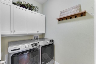 Discover refined Florida living in this beautifully appointed on The Rookery At Marco in Florida - for sale on GolfHomes.com, golf home, golf lot