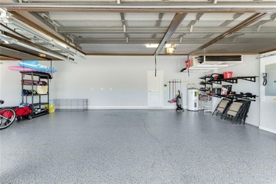 Discover refined Florida living in this beautifully appointed on The Rookery At Marco in Florida - for sale on GolfHomes.com, golf home, golf lot