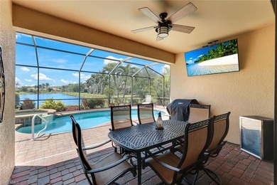 Discover refined Florida living in this beautifully appointed on The Rookery At Marco in Florida - for sale on GolfHomes.com, golf home, golf lot