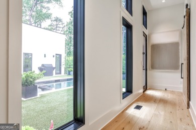 Welcome to this stunning contemporary gem, one of only 5 homes on Druid Hills Golf Club in Georgia - for sale on GolfHomes.com, golf home, golf lot