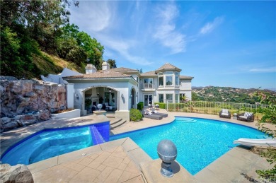 This elegant Mediterranean style single family home, leads by a on Chevy Chase Country Club in California - for sale on GolfHomes.com, golf home, golf lot