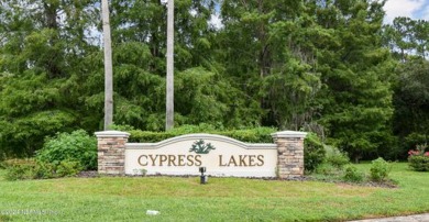 Welcome to your dream home in Cypress Lakes! This stunning on St. Johns Golf Club in Florida - for sale on GolfHomes.com, golf home, golf lot