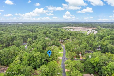 Nestled in the established community of Carolina Shores, this on Carolina Shores Golf Course in North Carolina - for sale on GolfHomes.com, golf home, golf lot