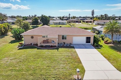 TRANQUIL WATERFRONT LIVING IN THE HEART OF ROTONDA on Rotonda Golf and Country Club The Hills Course in Florida - for sale on GolfHomes.com, golf home, golf lot