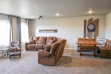 Stunning Whispering Ridge Home Near Hawktree Golf Course! on Hawktree Golf Club in North Dakota - for sale on GolfHomes.com, golf home, golf lot