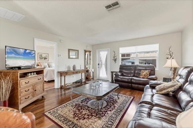 TRANQUIL WATERFRONT LIVING IN THE HEART OF ROTONDA on Rotonda Golf and Country Club The Hills Course in Florida - for sale on GolfHomes.com, golf home, golf lot