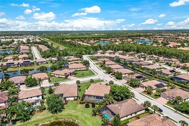 Discover refined Florida living in this beautifully appointed on The Rookery At Marco in Florida - for sale on GolfHomes.com, golf home, golf lot